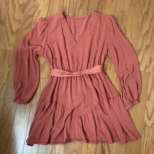 Muted rust long-sleeve mini dress with optional tie waist ribbon